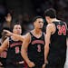 Jalen Suggs (1) celebrated with Chet Holmgren (34) in early 2020 while teammates at Minnehaha Academy.