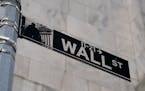 A Wall Street sign is shown in the Financial District, Oct. 13, 2021, in the Manhattan borough of New York. 