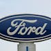 FILE - A Ford logo is seen on signage at Country Ford in Graham, N.C., Tuesday, July 27, 2021. Ford is issuing two recalls covering over 737,000 vehic