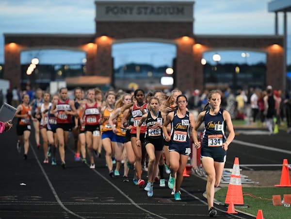 Rosemount's Lauren Peterson, far right, led the pack of runners early on her way to winning the girls' 3200 meter run with a time of 10:54.82.


] 