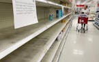 A woman shops for baby formula at Target in Annapolis, Maryland, on May 16, 2022, as a nationwide shortage of baby formula continues due to supply cha