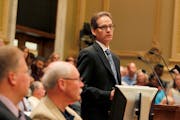 In 2013, Peter Ginder addressed crowded controversial hearings in Minneapolis City Council chambers on whether the city should form its own utility.