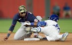 Kansas City’s Dairon Blanco is tagged out by Twins second baseman Jorge Polanco during the fifth inning Friday