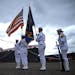 The US Naval Sea Cadet Corps, Twin Cities Squadron, prepared to present the colors before the commissioning ceremony for the USS Minneapolis-St. Paul 