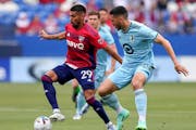 FC Dallas’ Franco Jara tried to go around Minnesota United defender Michael Boxall during the first half Sunday night in Frisco, Texas.