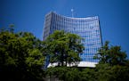 FILE - The United Nation flag waves in the wind on the top of an UN building in Geneva, Switzerland Monday, June 14, 2021. A veteran Russian diplomat 