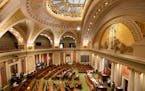 Representatives spoke in the House chamber during a recess Sunday before a midnight deadline to pass bills. 
