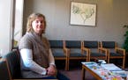 In this Feb. 20, 2013, photo, Tammi Kromenaker, director of the Red River Women’s Clinic, sat in the waiting area of the facility in Fargo, N.D. Kro