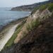 Small waves crash into the beach surrounded by cliffs in Palos Verdes Estates, Calif., Monday, May 23, 2022.Four people fell off a Southern California