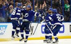 Tampa Bay Lightning left wing Pat Maroon (second from left) celebrated with teammates after scoring in the third period.