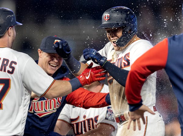 Gio Urshela was swarmed after his infield single scored Max Kepler for the game-winning run in the bottom of the ninth on Monday night.