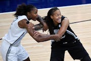 Rebekkah Brunson, left, and Seimone Augustus, right, played against each other in the WNBA All-Star Game in 2018 at Target Center.