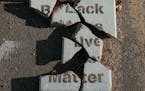 A shattered block at George Floyd Square in Minneapolis on May 14. Two years after George Floyd’s murder, the street art created during that summer�