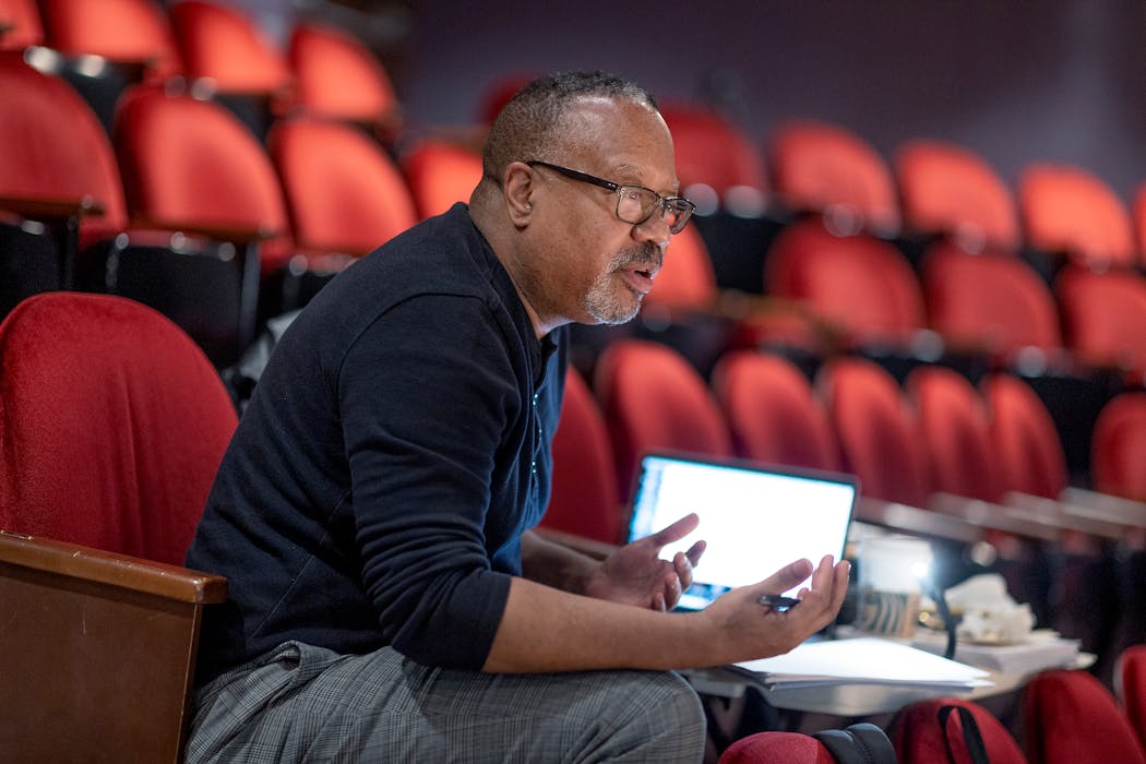 Director Talvin Wilks guided Mikell Sapp during the rehearsal of “Charlie (Brown) Black” last week at the Pillsbury House Theatre in Minneapolis.