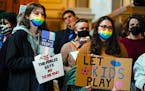 People protested against HB1041, a bill to ban transgender women and girls from participating in school sports that match their gender identity, durin