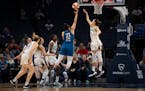 Lynx guard Kayla McBride (21) went up for a layup in the first quarter shot against the Liberty on Tuesday night at Target Center.