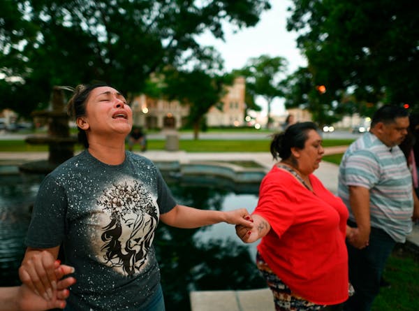 Kladys Castellón prayed during a vigil for the victims of the Robb Elementary School shooting in Uvalde, Texas. An 18-year-old gunman opened fire at 