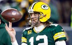 Packers quarterback Aaron Rodgers was not present as the team started voluntary organized team activities this week.