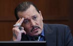 Actor Johnny Depp testifies in the courtroom in the Fairfax County Circuit Courthouse in Fairfax, Va., Wednesday, May 25, 2022. 