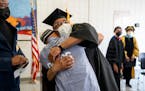 Walter L. McCoy Jr. hugged a student in the Goucher Prison Education Partnership after the Goucher College graduation ceremony at the Maryland prison-