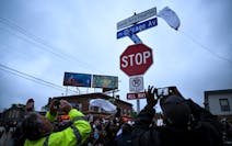 A new “George Perry Floyd Square” sign was unveiled in front of hundreds of community members Wednesday in Minneapolis.