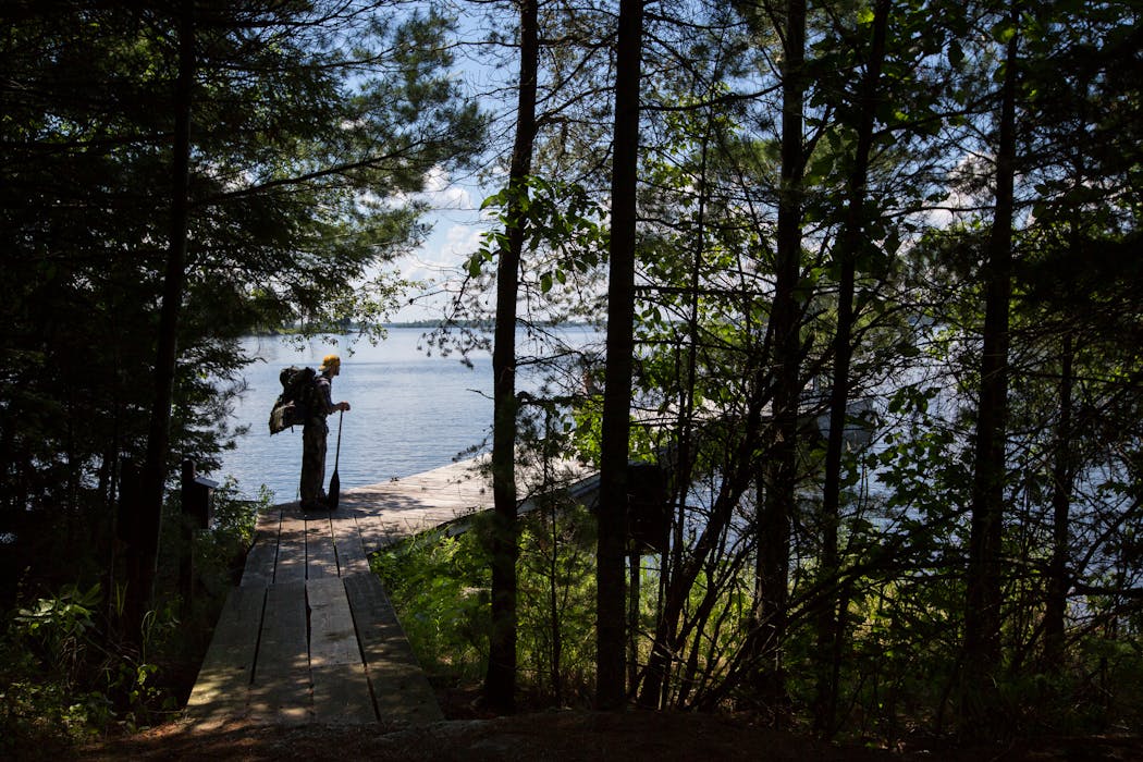 Cameron Giebink starts on the Locator Lake Trail for a few days of backcountry camping on the Kabetogama Peninsula in Voyageurs National Park. 