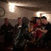 Daniel, right, a 16-year-old Ukrainian, receives instruction on weapons handling and other combat skills during a training event for volunteers joinin