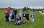 Fourth graders from Southgate Elementary School in Austin, Minn. planted a community orchard Thursday, May 26, 2022