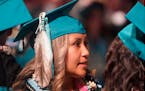 Brailyn Jake wears an eagle feather at her graduation from Cedar City High School Wednesday from Cedar City High School on Wednesday, May 25, 2022, in