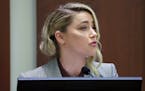 Actor Amber Heard testifies in the courtroom in the Fairfax County Circuit Courthouse in Fairfax, Va., Thursday, May 26, 2022. 