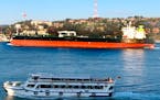 The Greek-flagged oil tanker Prudent Warrior, background, is seen as it sails past Istanbul, Turkey, April 19, 2019. 