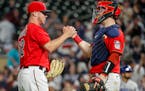 Twins reliever Emilio Pagan, left, celebrated with catcher Ryan Jeffers after Pagan came in to get the final out of a 10-7 victory over the Royals at 