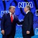 NRA executive vice president Wayne Lapierre, right, introduces former president Donald Trump to speak during the Leadership Forum at the National Rifl