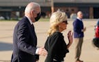 President Joe Biden and first lady Jill Biden walk to board Air Force One at Delaware Air National Guard Base in New Castle, Del., Sunday, May 29, 202