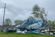 A pole shed destroyed by a powerful storm Monday was seen Tuesday, May 31, outside Forada, Minn.