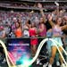 Concertgoers dance during Coldplay’s Music of the Spheres world tour on Thursday, May 12, 2022, at State Farm Stadium in Glendale, Ariz. 