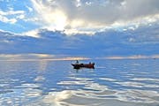A crazy sky greeted early morning anglers on Lake Winnibigoshish Saturday May 14 2022. Minnesota Fishing Opener. .(Dennis Anderson, Star Tribune)