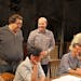 Collaborators David Simpatico (standing, left), Peter Rothstein (standing, right) Michael Holland (seated, with pencil) and “Twelve Angry Men” cas
