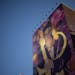 A giant mural of Minneapolis music icon Prince, the result of the Crown Our Prince Mural Project painted by Hiero Veiga on the exterior wall of parkin