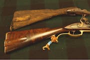 The mysterious old gun stock, along with a replica made by Ray Nelson.