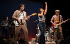 Mayda Miller, Christopher Thomas Pow, Danielle Troiano, and Greg Watanabe, from left, perform a song during a tech rehearsal for ‘Cambodian Rock Ban