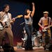 Mayda Miller, Christopher Thomas Pow, Danielle Troiano, and Greg Watanabe, from left, perform a song during a tech rehearsal for ‘Cambodian Rock Ban