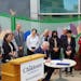 Gov. Tim Walz led a ceremonial bill signing of bipartisan mental health reform legislation on Tuesday after touring the construction of a new inpatien