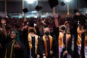 Minneapolis South High School’s graduates tossed their caps in the air at the conclusion of their commencement Wednesday evening.