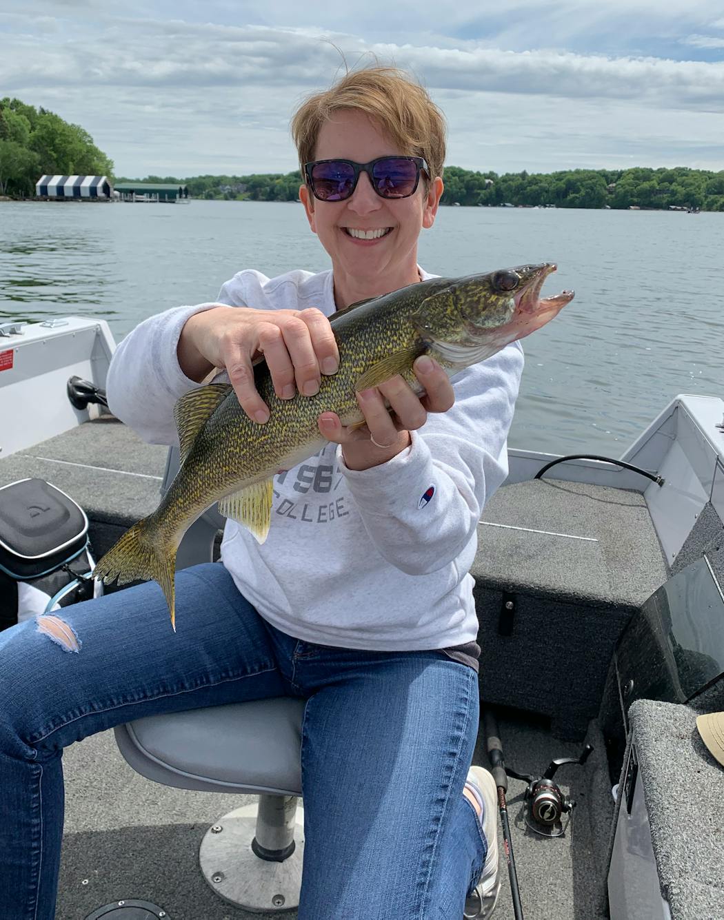 Rachel Daly held the walleye caught on the same harness, nabbed by the muskie.