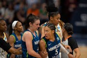 After Indiana Fever guard Victoria Vivians (35) slammed into Minnesota Lynx forward Aerial Powers (3) as she drove up court in the fourth quarter, the