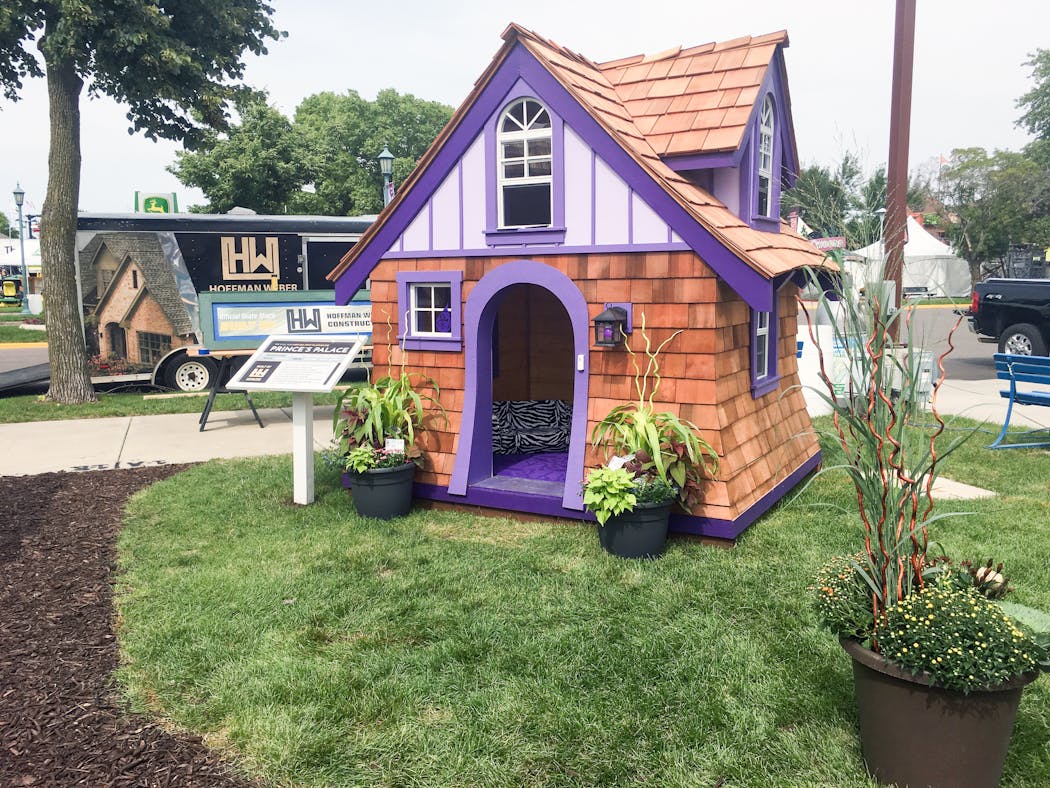 Hoffman Weber Construction of New Brighton builds “doggy mansions” for display at the Minnesota State Fair. The Prince’s Palace Playhouse features purple trim and an LED sound bar to broadcast “Purple Rain” and other Prince pop hits.