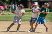 Sheridan Elementary School students participated in their annual field day with a game of tug of war at nearby Logan Park on Friday. The last day of c
