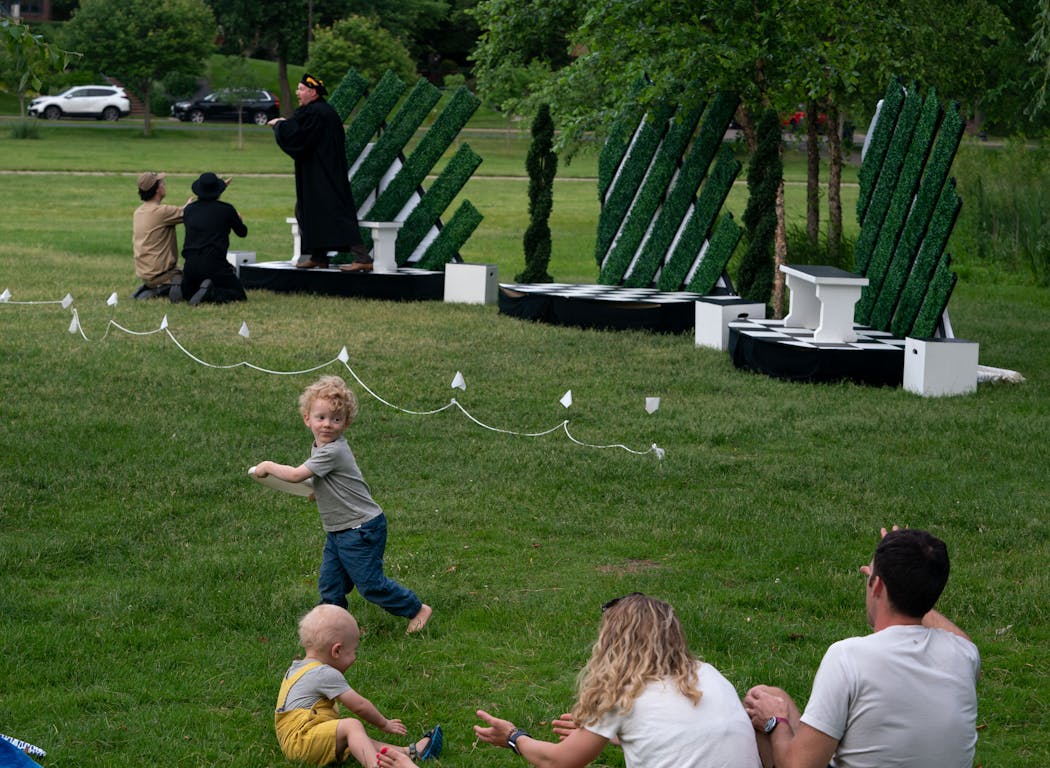 Max Delaney, 3, played Frisbee with his family last week during a Shakespeare in Our Parks performance of “Love’s Labor’s Lost” at Lake of the Isles in Minneapolis. 