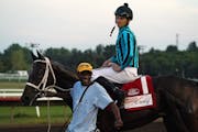 Jockey Jareth Loveberry smiled atop King Of Miami, son of American Pharoah, after he beat out Modern Science and favorite T-D Dance to win the Mystic 